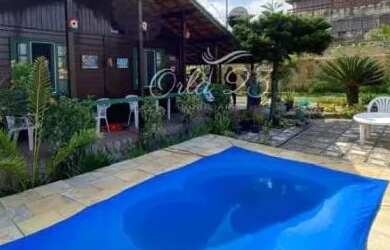 Imagem: A casa possui 5 Dormitórios, 2 Banheiros e está localizado