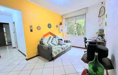 Imagem: O apartamento possui 2 Dormitórios, 1 Banheiro, 1 Vaga na garagem