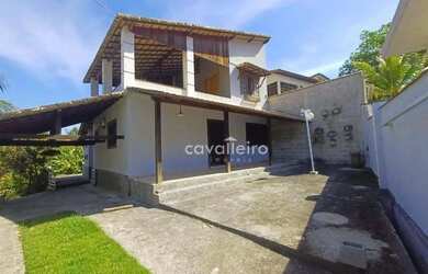 Imagem: A casa possui 2 Dormitórios, 3 Banheiros, 2 Vagas na garagem