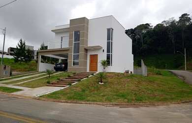 Imagem: A casa em condomínio possui 3 Dormitórios, 5 Banheiros, 5