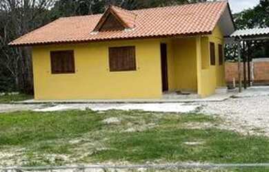 Imagem: A casa possui 2 Dormitórios, 2 Vagas na garagem e está localizado