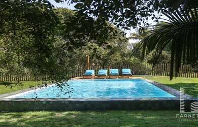 Imagem: A casa possui 4 Dormitórios, 5 Banheiros, 300m² de Área e