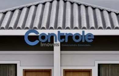 Imagem: A casa possui 2 Dormitórios, 2 Banheiros, 1 Vaga na garagem