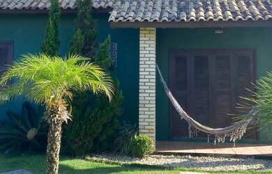 Imagem: A casa possui 4 Dormitórios, 2 Banheiros, 160m² de Área e