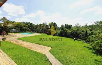 Imagem: A casa possui 5 Dormitórios, 5 Banheiros, 5 Vagas na garagem