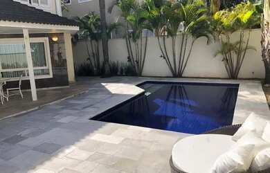 Imagem: A casa em condomínio possui 4 Dormitórios, 5 Banheiros, 4