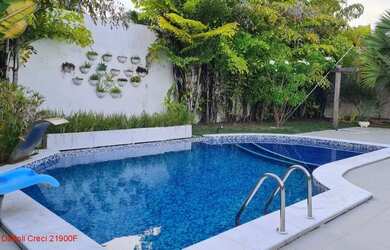 Imagem: A casa em condomínio possui 5 Dormitórios, 5 Banheiros, 5