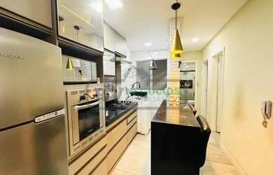 Imagem: O apartamento possui 2 Dormitórios, 1 Banheiro, 1 Vaga na garagem