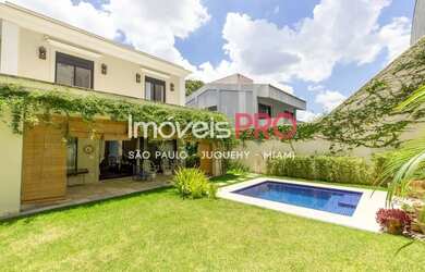 Imagem: A casa possui 3 Dormitórios, 4 Banheiros, 4 Vagas na garagem