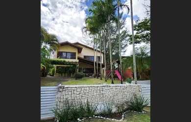 Imagem: A casa possui 5 Dormitórios, 5 Banheiros, 4 Vagas na garagem