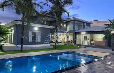 Imagem: A casa em condomínio possui 4 Dormitórios, 4 Banheiros, 5