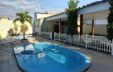 Imagem: A casa em condomínio possui 4 Dormitórios, 5 Banheiros, 2