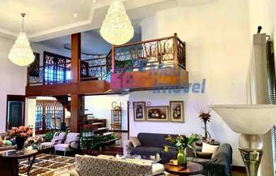 Imagem: A casa em condomínio possui 5 Dormitórios, 5 Banheiros, 5