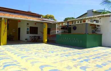 Imagem: A casa possui 3 Dormitórios, 4 Banheiros, 310m² de Área