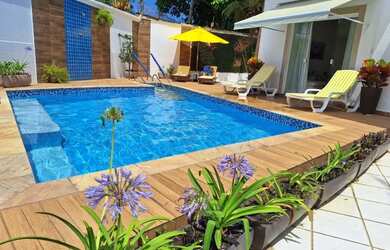 Imagem: A casa possui 3 Dormitórios, 3 Banheiros, 4 Vagas na garagem