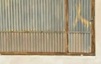 Imagem: A casa possui 2 Dormitórios, 1 Banheiro, 2 Vagas na garagem