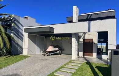Imagem: A casa em condomínio possui 4 Dormitórios, 5 Banheiros, 180m²