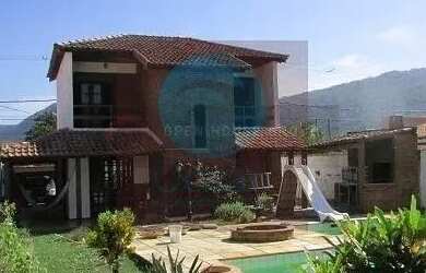 Imagem: A casa possui 5 Dormitórios, 3 Banheiros, 3 Vagas na garagem