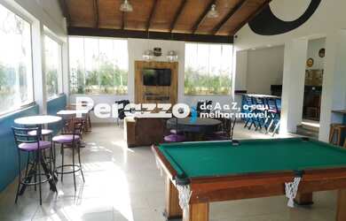 Imagem: A casa em condomínio possui 4 Dormitórios, 4 Banheiros, 1.300m²