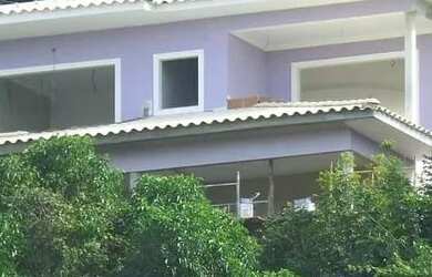 Imagem: A casa possui 3 Dormitórios, 3 Vagas na garagem e está localizado