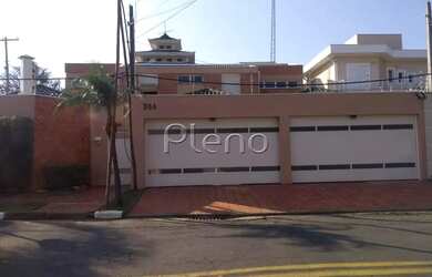 Imagem: A casa possui 4 Dormitórios, 4 Banheiros, 4 Vagas na garagem