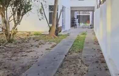 Imagem: A casa possui 3 Dormitórios, 3 Banheiros, 5 Vagas na garagem