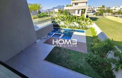 Imagem: A casa em condomínio possui 5 Dormitórios, 5 Banheiros, 3