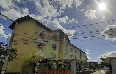 Imagem: O apartamento possui 2 Dormitórios, 1 Banheiro, 2 Vagas na