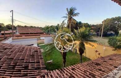 Imagem: A casa possui 4 Dormitórios, 2 Banheiros, 5 Vagas na garagem