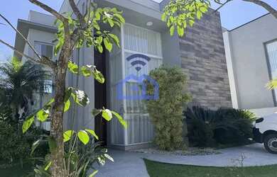 Imagem: A casa possui 4 Dormitórios, 5 Banheiros, 2 Vagas na garagem