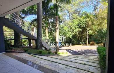 Imagem: A casa em condomínio possui 5 Dormitórios, 5 Banheiros, 2