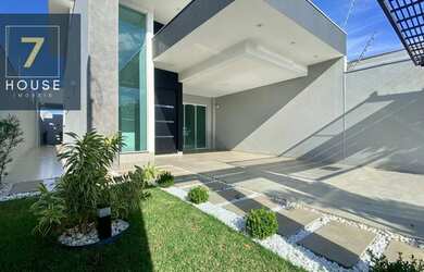 Imagem: A casa possui 3 Dormitórios, 3 Banheiros, 3 Vagas na garagem