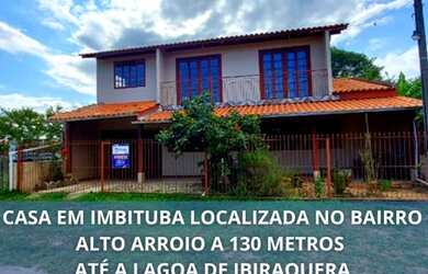 Imagem: A casa possui 5 Dormitórios, 3 Banheiros, 2 Vagas na garagem