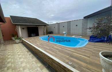 Imagem: A casa possui 3 Dormitórios, 3 Banheiros, 4 Vagas na garagem