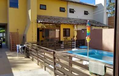 Imagem: A casa possui 4 Dormitórios, 3 Banheiros, 2 Vagas na garagem