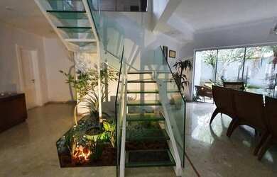 Imagem: A casa em condomínio possui 5 Dormitórios, 5 Banheiros, 4