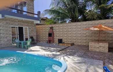 Imagem: A casa possui 5 Dormitórios, 3 Banheiros, 2 Vagas na garagem