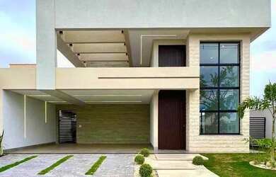 Imagem: A casa possui 3 Dormitórios, 3 Banheiros, 4 Vagas na garagem