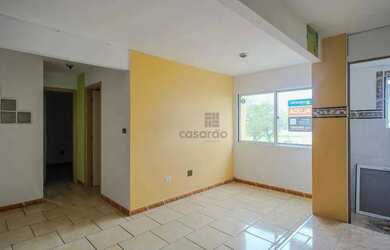 Imagem: O apartamento possui 2 Dormitórios, 1 Banheiro, 1 Vaga na garagem