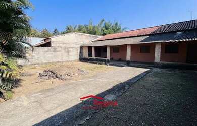 Imagem: A casa possui 2 Dormitórios, 1 Banheiro, 3 Vagas na garagem