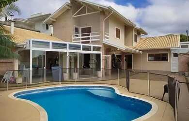 Imagem: A casa em condomínio à venda possui 3 Dormitórios, 4 Banheiros