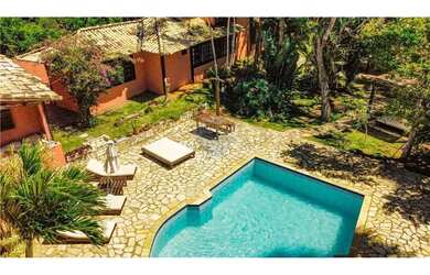 Imagem: A casa possui 5 Dormitórios, 5 Banheiros, 5 Vagas na garagem