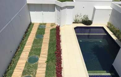 Imagem: A casa em condomínio possui 5 Dormitórios, 5 Banheiros, 3