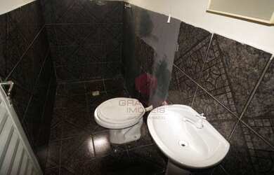 Imagem: A kitnet possui 1 Dormitório, 1 Banheiro, 1 Vaga na garagem