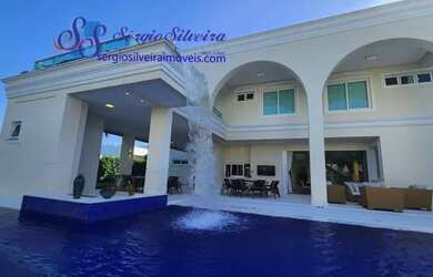 Imagem: A casa possui 4 Dormitórios, 5 Banheiros, 5 Vagas na garagem