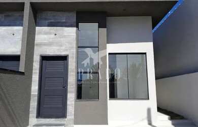 Imagem: A casa possui 3 Dormitórios, 2 Banheiros, 2 Vagas na garagem