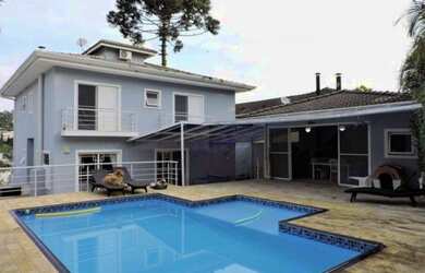 Imagem: A casa em condomínio possui 4 Dormitórios, 5 Banheiros, 5