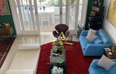 Imagem: A casa possui 4 Dormitórios, 5 Banheiros, 5 Vagas na garagem