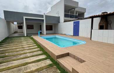 Imagem: A casa possui 2 Dormitórios, 3 Banheiros, 3 Vagas na garagem