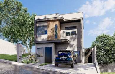 Imagem: A casa possui 3 Dormitórios, 2 Banheiros, 2 Vagas na garagem